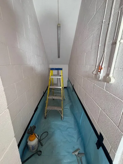 HSE-licensed asbestos gasket strip-out in W8